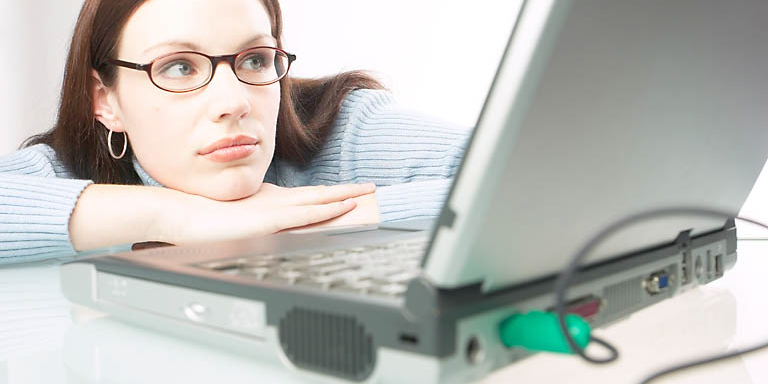 Woman using watching laptop computer screen uid